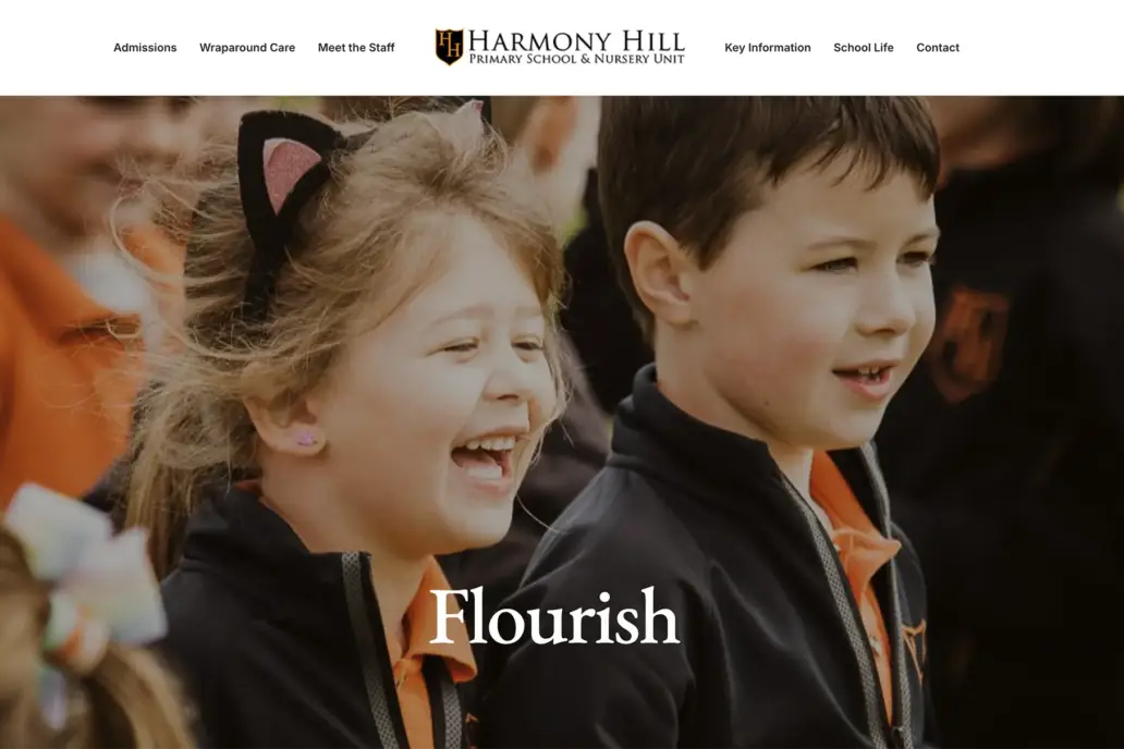 Happy pupils enjoying outdoor school life at Harmony Hill Primary School in Lisburn